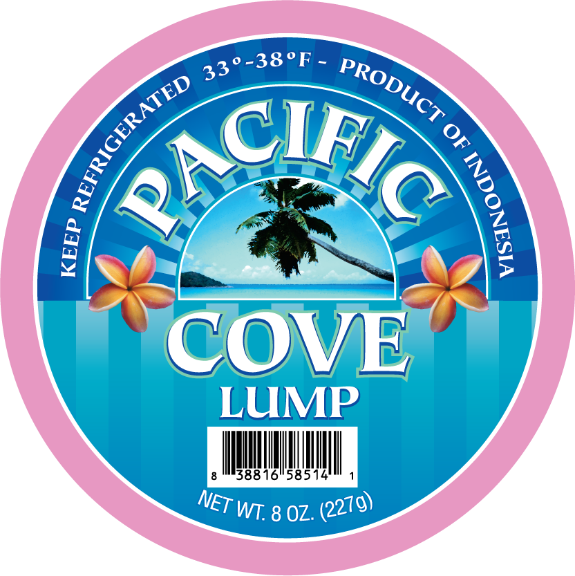Round label for Pacific Cove Lump, featuring palm tree, flowers, and blue ocean; product of Indonesia, 8 oz.