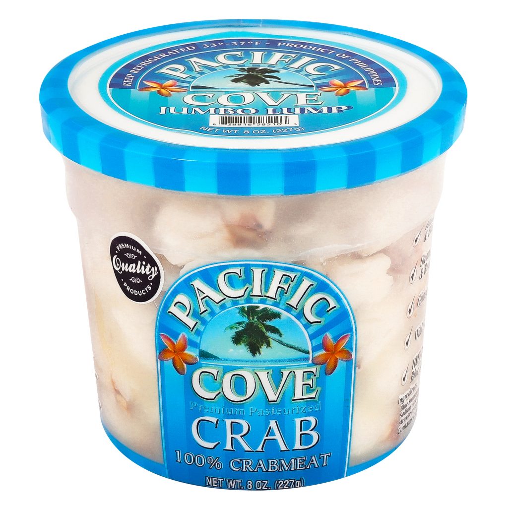 A plastic tub of Pacific Cove crabmeat with a blue lid and label, containing 8 oz of 100% crab meat.